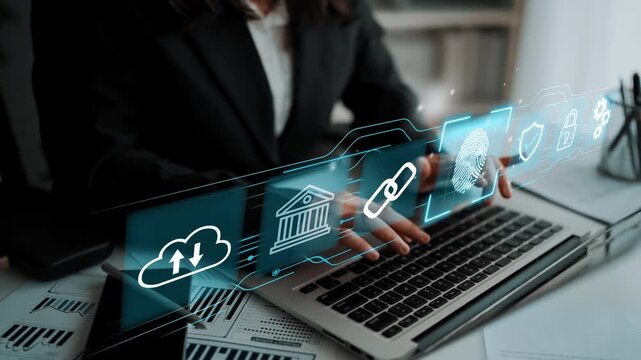 Business professional using laptop with digital security and technology icons for finance and banking security concepts. Entropy.