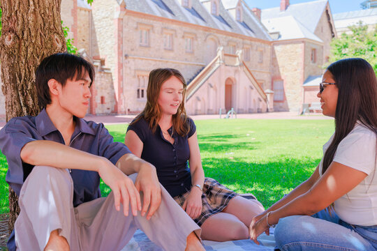 Young Students Relaxing and Chatting During Break Time