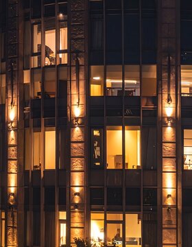 Modern office building at nighttime exterior.