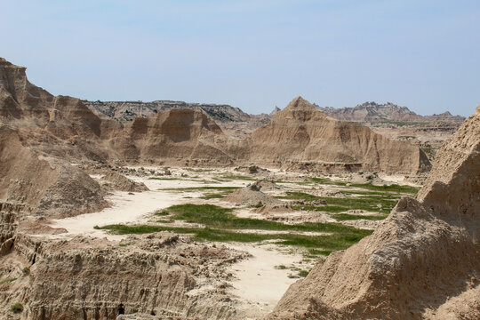 Badlands National Park Landscape Under Blue Summer Sky, South Dakota