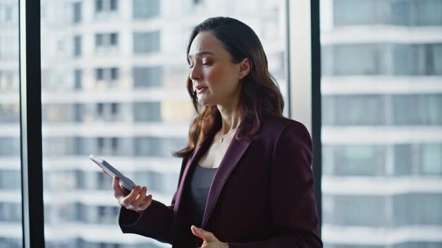 Shouting businesswoman calling cellphone arguing modern office building closeup