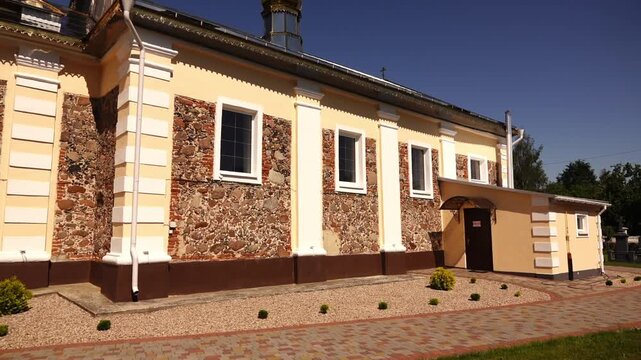 OSTROMECHEVO, BELARUS - JUNE 11 2022: Orthodox Church of St. Michael Archangel. Belarus, Brest district, Lyshchitsky village council, agro-town Ostromechevo.