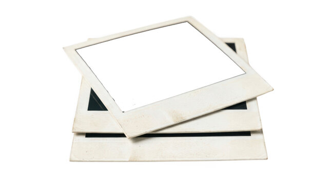 Stack of blank vintage polaroid photo frames isolated on transparent background