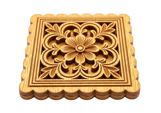 Square wooden coaster with a carved floral pattern and scalloped edges, isolated on a black background, woodworking craftsmanship