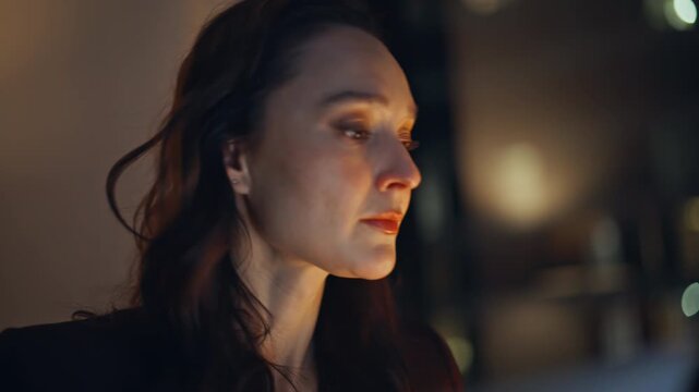 Portrait night manager working online project at office. Woman doing paperwork