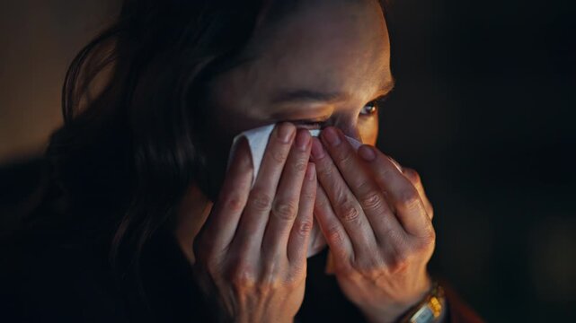 Crying lady wiping eyes reacting fail at workplace closeup. Disappointed woman
