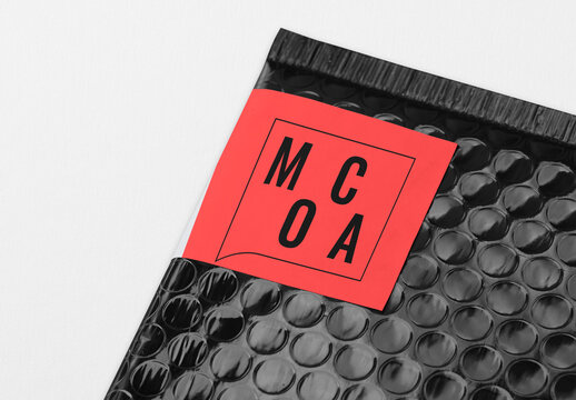 Black Bubble Mailer With Label Mockup PSD