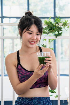 Woman yoga wellness lifestyle Healthy woman workout holding organic salad bowl healthy lifestyle. Wellness Asian women organic green salad tomato vegetable dish. Beautiful women healthcare lifestyle
