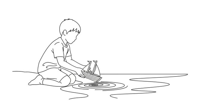 Child playing with paper boat in puddle.