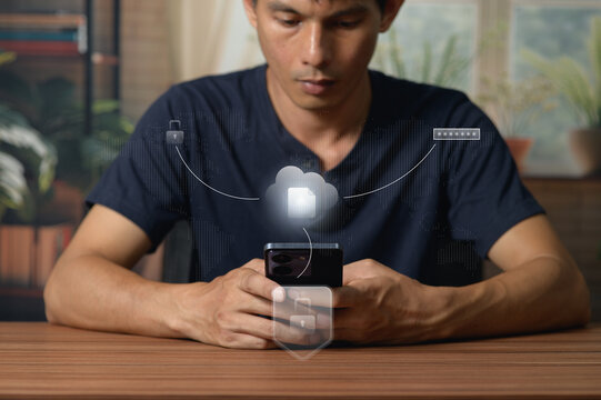 Young Man Using Smartphone with Cloud Computing and Data Transfer Concept