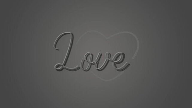 Love text rendered in a sophisticated embossed script font sits centered on a dark grey background to create an elegant design element suitable for romantic cards or minimalist creative projects.