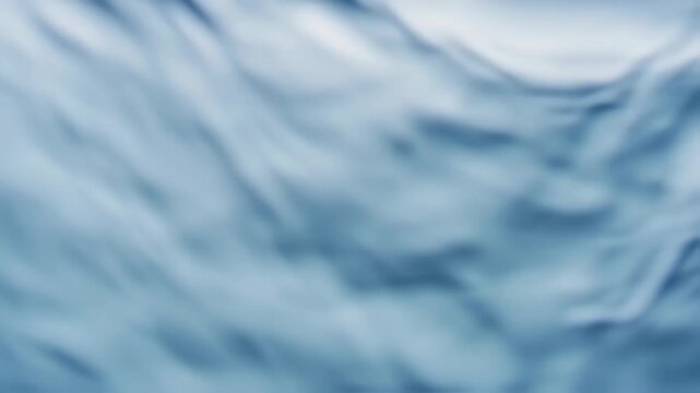 Blue water surface with gentle waves.