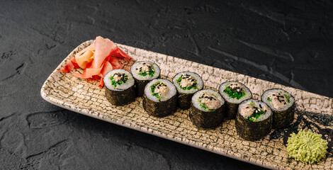 Tuna maki sushi rolls with ginger and wasabi © AntAlexStudio