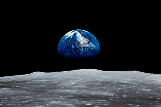 Earth Rising Over the Lunar Surface from Space.