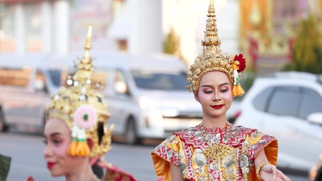 Traditional Thai Khon Dancers Performing on a City Street