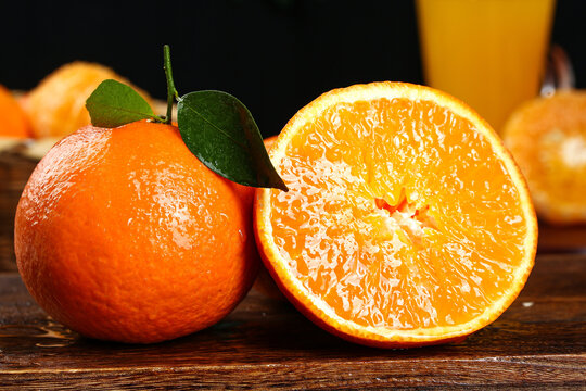 Fresh Whole and Sliced Orange with Citrus Juice