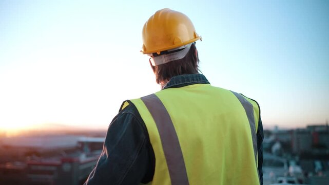Back, thinking and engineer in city for construction, inspection and planning for architecture. Space, man and hardhat outdoor with reflection, urban view and quality assurance for building project