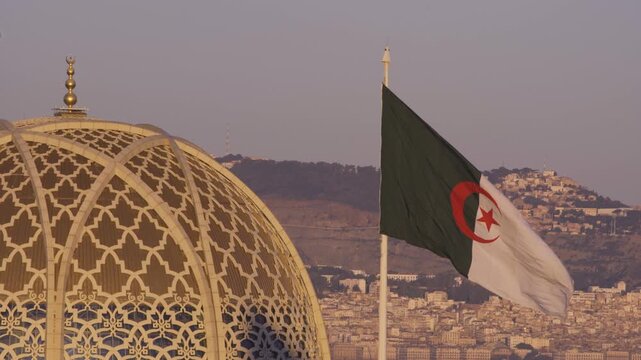 Golden Hour View of the Algerian Flag and City of Algiers