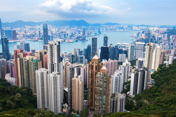 Fototapeta premium Hong Kong Skyline Aerial View with Victoria Harbour and Mountains