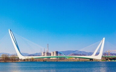 Fototapeta premium Shougang Bridge Beijing - Modern Cable-Stayed Bridge Over Water