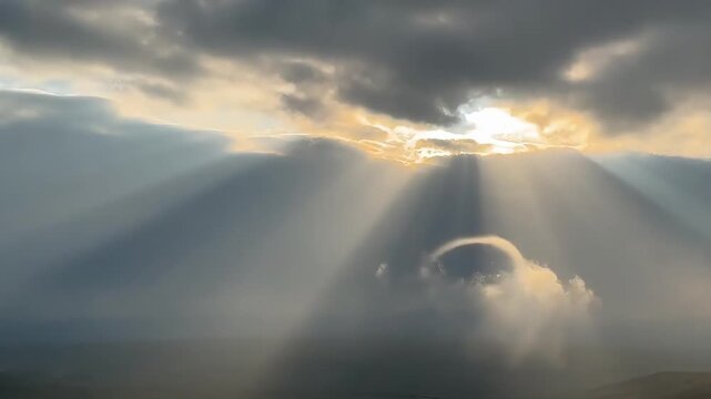 The Tyndall effect, or crepuscular rays, occur when sunlight penetrates gaps in clouds and is scattered by moisture or dust in the air, creating clear beams of light. These natural light and shadows, 