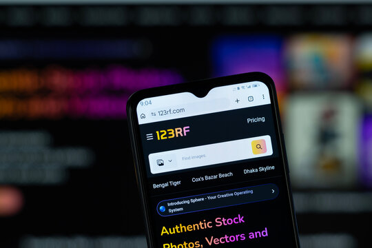Dhaka, Bangladesh - 05 May 2026: Close-up of 123RF's homepage on a smartphone.