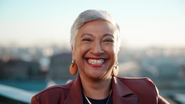 Face, funny and business woman on city rooftop for real estate, pride or urban development. About us, laughing and project management with mature broker or realtor outdoor for commercial property