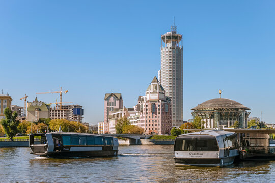 Moscow, Russia - September 11, 2025: Kosmodamianskaya and Sluice embankment. Pier for the river tram stop. Novospassky station. Moscow river scape.