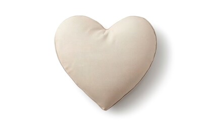 Obraz premium Minimalist beige heart shaped decorative pillow isolated on white background.