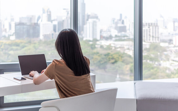 Digital lifestyle blog writer or business person work anywhere using smart device working on mobile smartphone and computer laptop via internet communication network technology e-commerce marketing