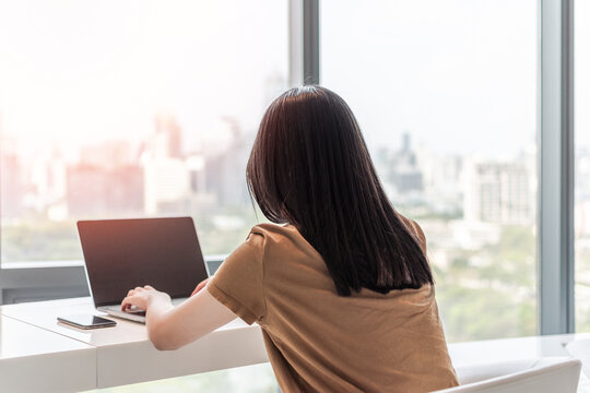 Digital lifestyle blog writer or business person work anywhere using smart device working on mobile smartphone and computer laptop via internet communication network technology, e-commerce marketing