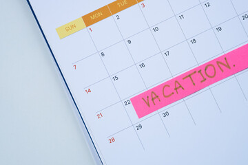 Vacation Calendar Planning with Sticky Note, Annual Leave and Holiday Schedule. © DenS
