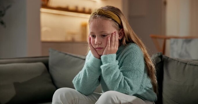 Alone, anxiety and child with depression on sofa in home living room for regret or sadness. Psychology, stress and thinking with lonely girl in apartment for boredom, frustration or reflection