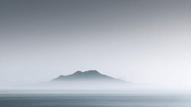 Mountain peak in foggy landscape