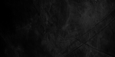 Fototapeta premium Dark scratched black background with textured surface and intersecting lines
