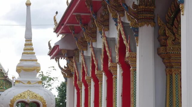 Ornate Thai Temple Roof Ornament Naga Gable Gold Mosaic Glass Detail Buddhist Architecture Decoration Cultural Heritage 