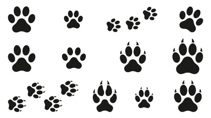 Fototapeta premium Multiple black animal paw prints isolated on a clean white background featuring various sizes and sharp claw details for design