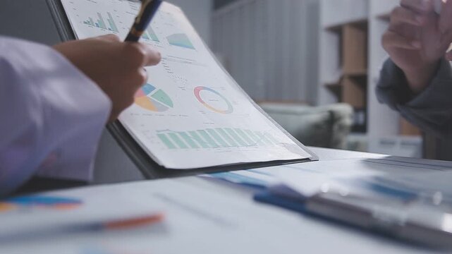 Business accounting concept, Business man using calculator with computer laptop, budget and loan paper in office.