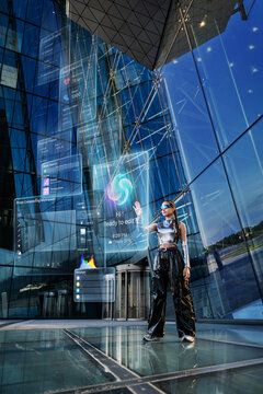 Futuristic woman using a holographic augmented reality interface