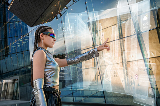 Young woman interacts with augmented reality screen