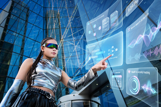 Futuristic girl interacting with holographic AR screen