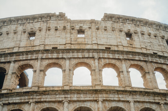 Looking up at the ancient Roman Colosseum exterior