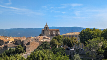Fototapeta premium The Église Notre-Dame de Piège in the picturesque village of Saignon in the Luberon, in the Provence-Alpes-Côte d'Azur region of France.