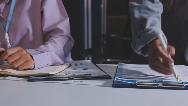 Business accounting concept, Business man using calculator with computer laptop, budget and loan paper in office.