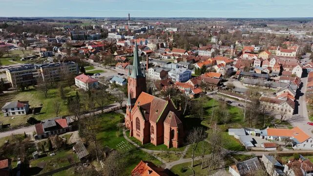 Aerial Orbit Around St Anne Lutheran Church Above Historic Kuldiga Latvia Town