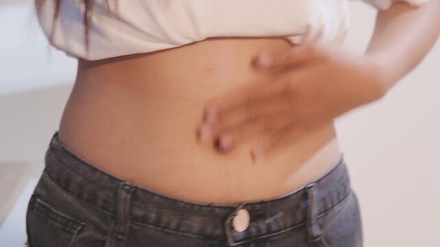 fat woman, fat belly, chubby, obese woman hand holding excessive belly fat with measure tape, woman diet lifestyle concept