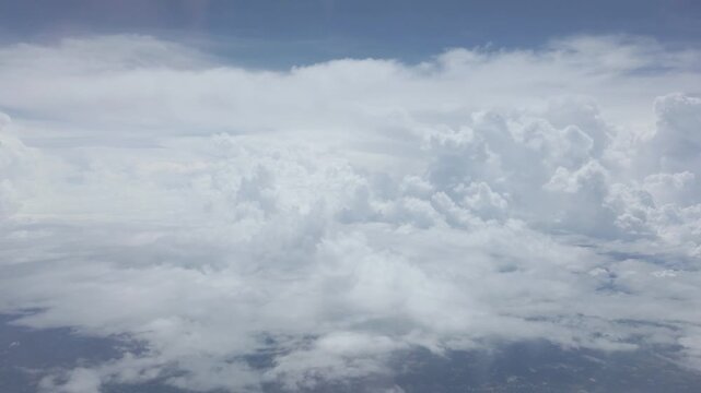 aerial footage of flying through the sky through fluffy clouds,aerial view of cloud in sky in natural nature background,Aerial view flying in the sky above blue and white clouds