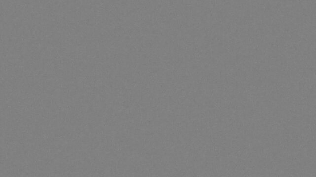 Old Retro TV - Static tv black and white noise caused by bad signal reception. Huge noise and glitch on black background.
 Old film VHS tv overlay effect, Retro noise tv grain texture footage 
