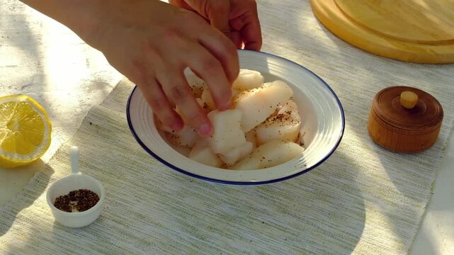 Step-by-step instructions for cooking cod or other white fish wrapped in thinly sliced ​​bacon on a charcoal grill outdoors in the summer. Step-by-step video recipes. Horizontal video.