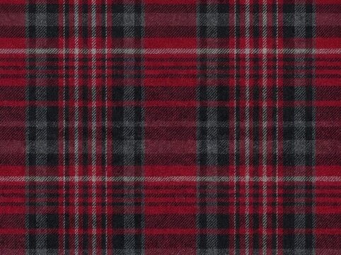 Red tartan plaid fabric with a traditional pattern seamless textile background